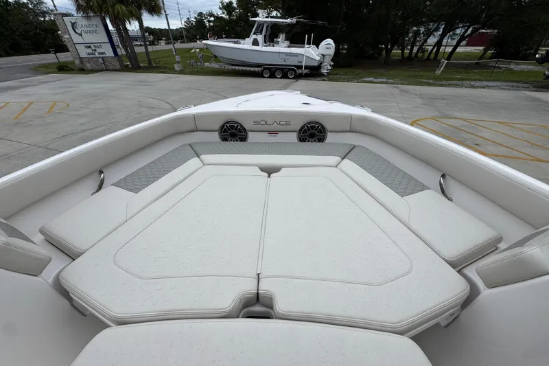 Slide: The Image of 2026 Solace 28 HCS boat with spacious seating and sleek design. - 17