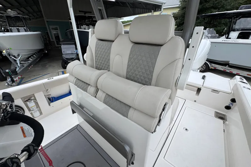 Slide: The Image of Luxurious seating on 2026 Solace 28 HCS boat, featuring plush, ergonomic design. - 27