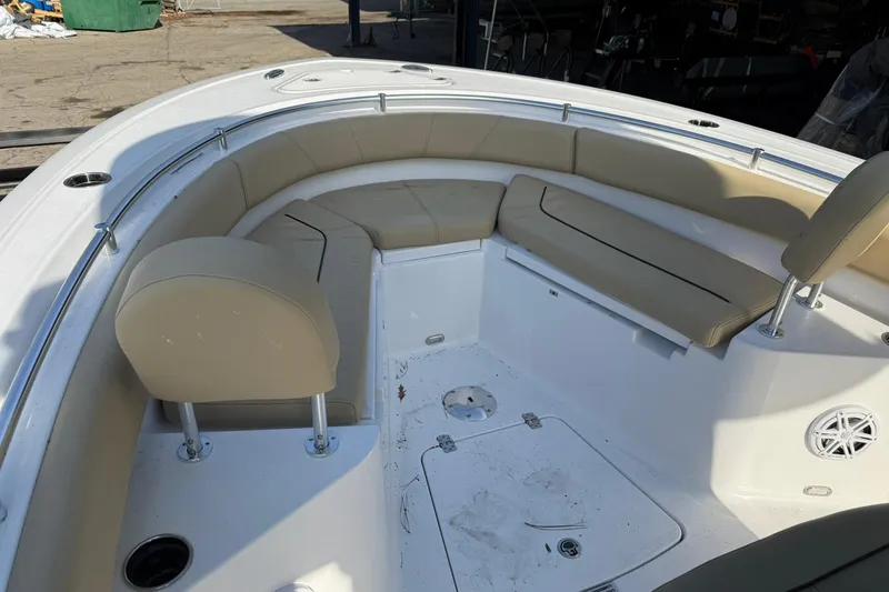 Slide: The Image of 2026 Sportsman Heritage 231 Center Console boat with spacious seating and modern design. - 12