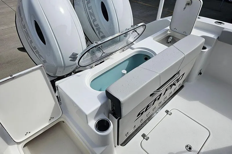 Slide: The Image of 2026 Sea Pro 262 Offshore boat with Suzuki engines and livewell. - 12