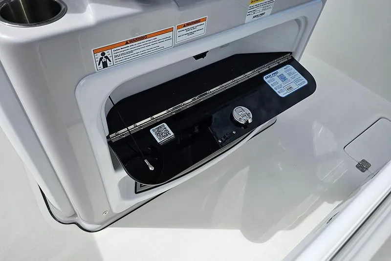 Slide: The Image of 2026 Sea Pro 262 Offshore boat compartment with QR code and safety warnings. - 30