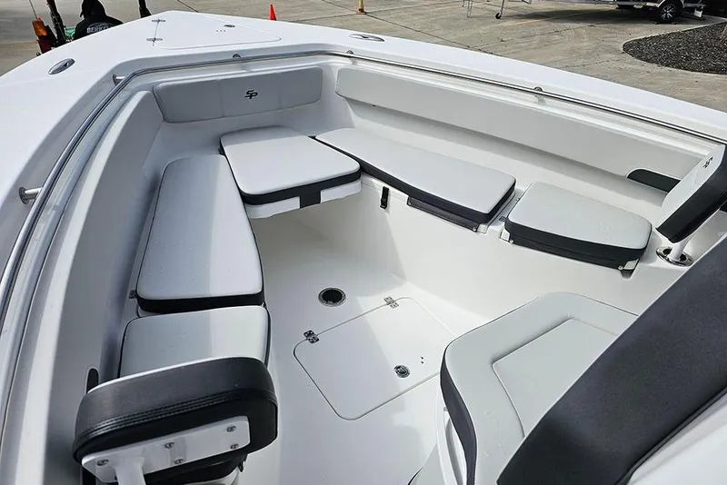Slide: The Image of Interior view of 2026 Sea Pro 262 Offshore boat with cushioned seating. - 35