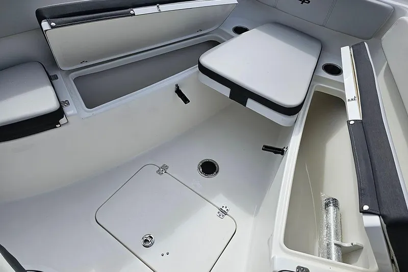 Slide: The Image of 2026 Sea Pro 262 Offshore boat interior with seating and storage compartments. - 37