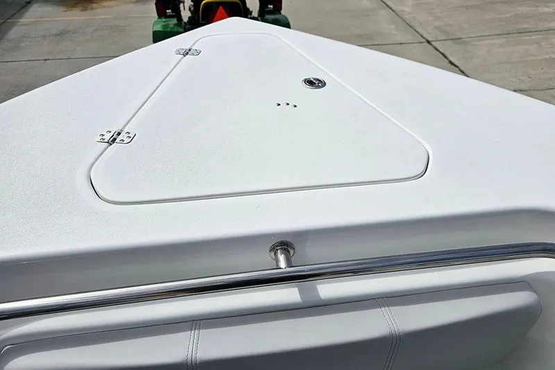 Slide: The Image of 2026 Sea Pro 262 Offshore boat deck with storage hatch and railing. - 39