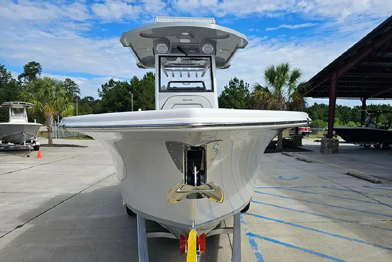 Slide: The Image of 2026 Sea Pro 262 Offshore boat displayed outdoors on a sunny day. - 4