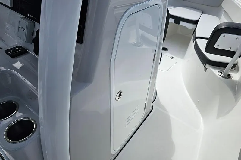 Slide: The Image of 2026 Sea Pro 262 Offshore boat interior with seating and storage compartments. - 43