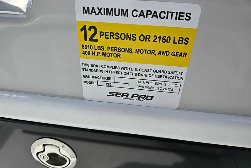 Slide: The Image of 2026 Sea Pro 262 Offshore capacity label, 12 persons or 2160 lbs, 400 HP motor. - 48