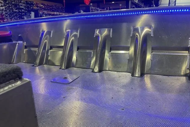 Slide: The Image of Interior view of 2025 Blazer SS 17' boat with metallic finish and blue LED lighting. - 10