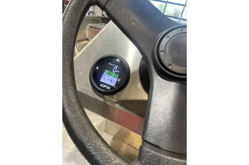 Slide: The Image of Steering wheel and GPS display of 2025 Blazer SS 17' vehicle interior. - 5