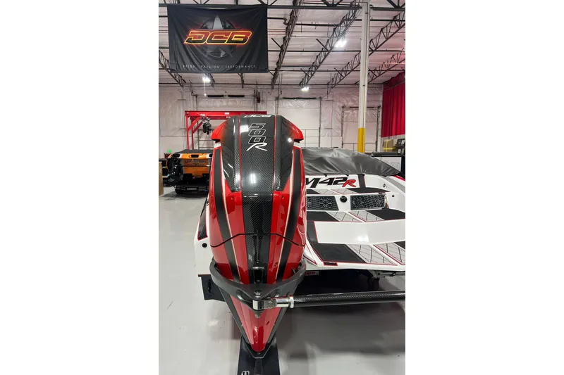 Slide: The Image of 2025 Daves Custom Boats M42R with 500R engine in showroom. - 19