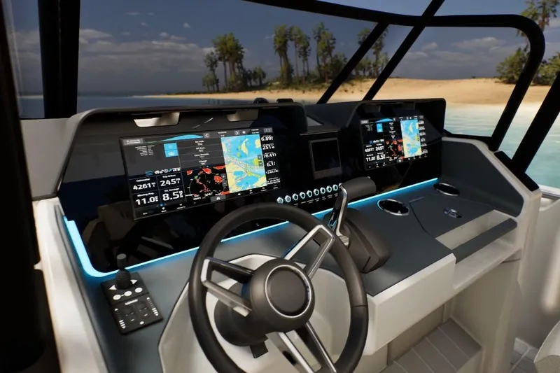 Slide: The Image of 2026 Wellcraft 28 T-Top boat dashboard with advanced navigation screens and steering wheel. - 10