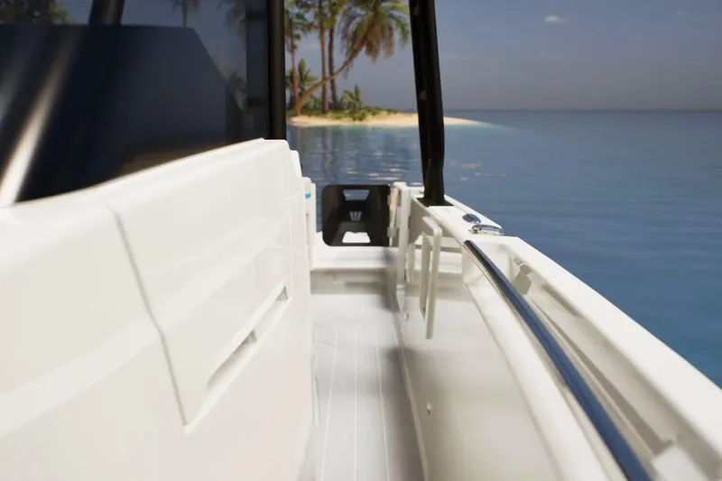 Slide: The Image of 2026 Wellcraft 28 T-Top boat near tropical island, showcasing sleek design and ocean view. - 4