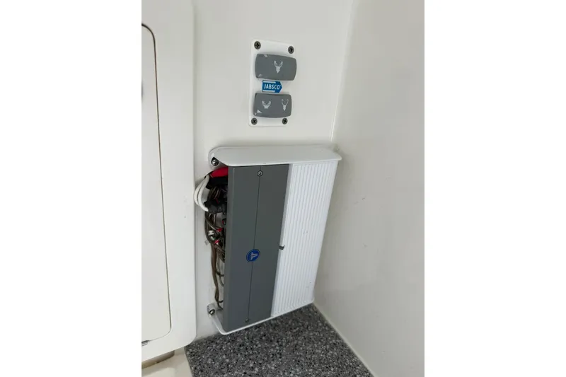 Slide: The Image of Electrical panel and Jabsco control on 2020 World Cat 280 CC-X boat. - 14