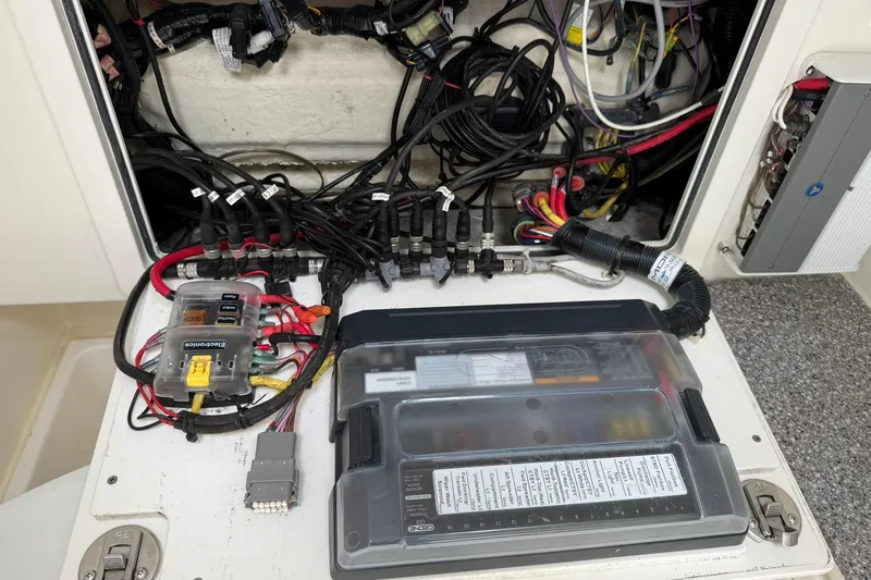 Slide: The Image of Electrical wiring and components inside a 2020 World Cat 280 CC-X boat. - 15