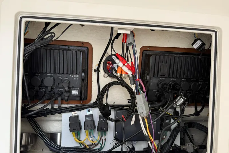 Slide: The Image of Electrical wiring and components inside a 2020 World Cat 280 CC-X boat. - 16