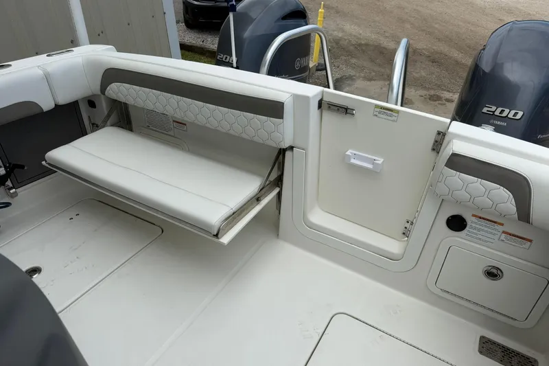 Slide: The Image of 2020 World Cat 280 CC-X boat interior with foldable seating and Yamaha engines. - 9