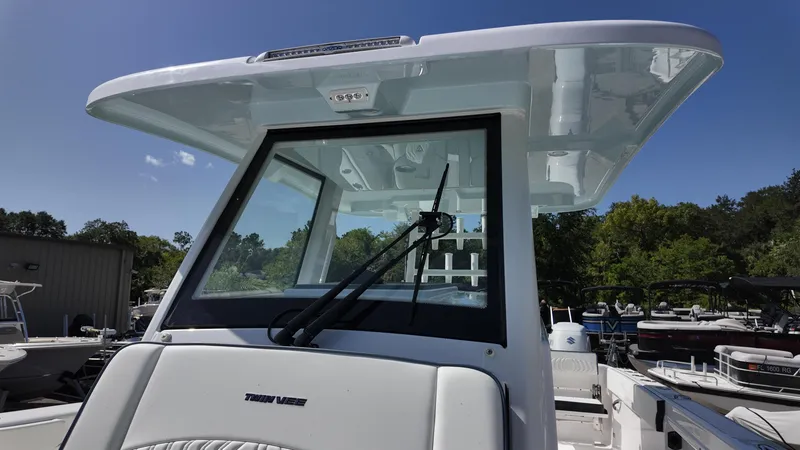 Slide: The Image of 2026 Twin Vee 280 GFX2 CC boat with sleek design and modern features. - 16