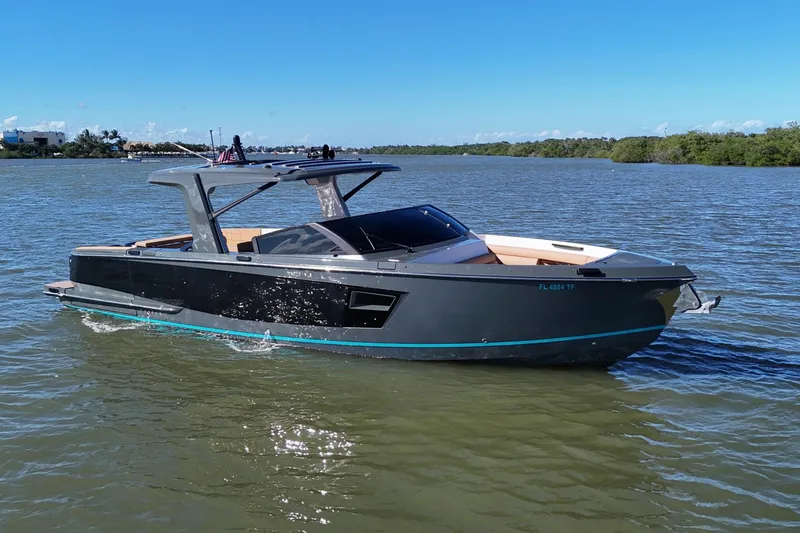 The Image of 2022 Aviara AV40 OB boat cruising on a calm river under a clear blue sky. - 0