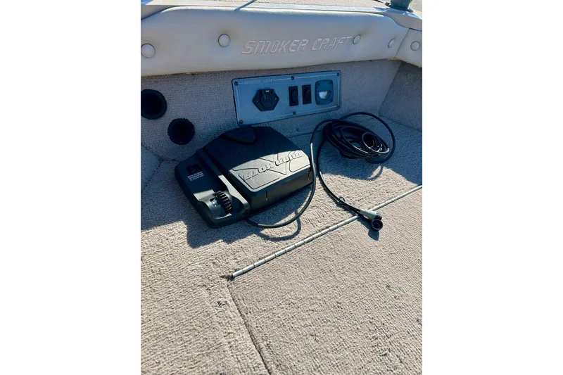 Slide: The Image of 2000 SMOKERCRAFT 161 Pro Mag boat interior with control panel and wiring. - 12