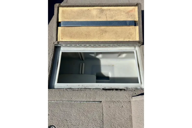 Slide: The Image of Open storage compartment on 2000 SMOKERCRAFT 161 Pro Mag boat. - 20