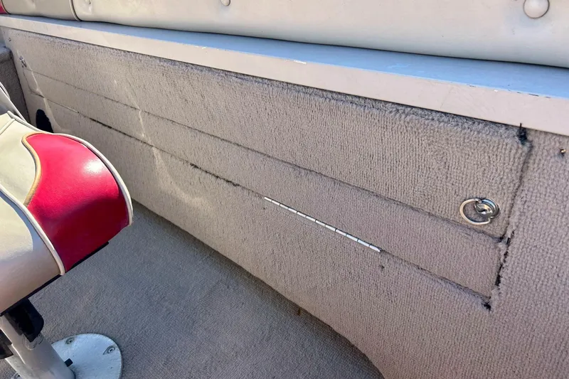 Slide: The Image of 2000 SMOKERCRAFT 161 Pro Mag interior with red and white seating detail. - 34