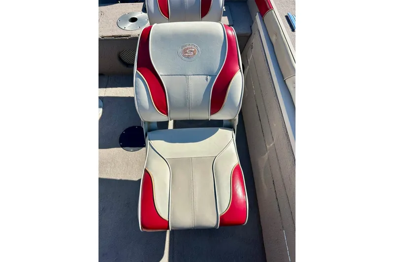 Slide: The Image of 2000 SMOKERCRAFT 161 Pro Mag boat seat with red and gray upholstery. - 38