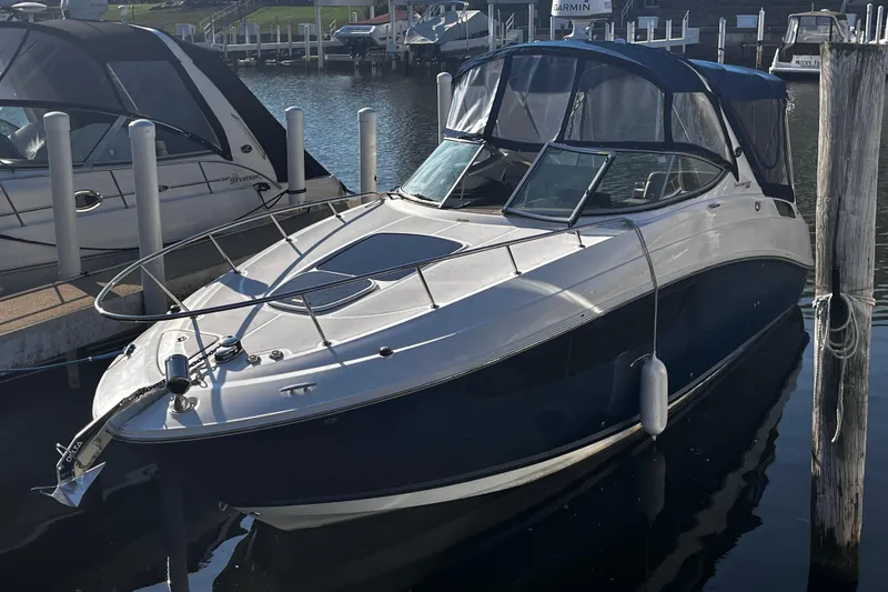 The Image of 2016 Sea Ray 280 Sundancer docked at marina, featuring sleek design and modern amenities. - 0