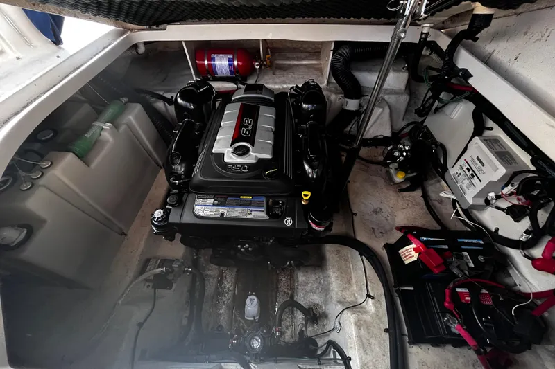 Slide: The Image of Engine compartment of 2016 Sea Ray 280 Sundancer with 6.2L engine and equipment. - 27