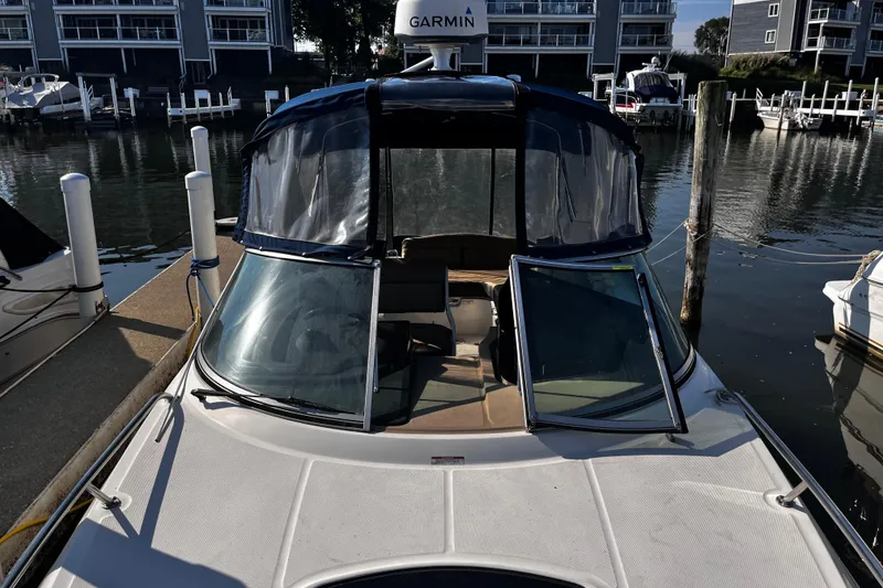 Slide: The Image of 2016 Sea Ray 280 Sundancer docked at marina with Garmin equipment. - 5