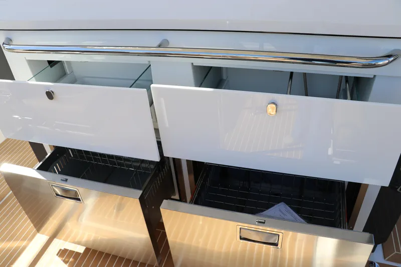 Slide: The Image of Modern kitchen drawers and cabinets in Nimbus T11, 2025 model, with sleek design and metallic finish. - 21