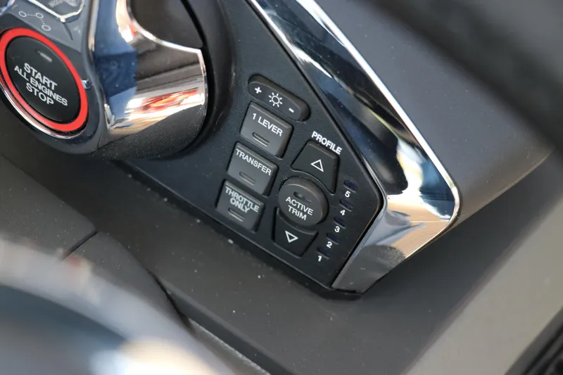 Slide: The Image of Control panel of 2025 Nimbus T11 with engine start and trim buttons. - 37