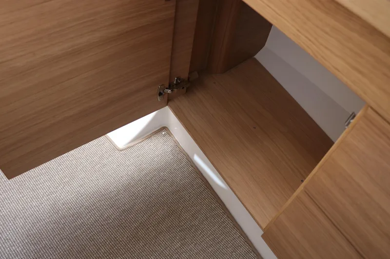 Slide: The Image of Open wooden cabinet in 2025 Nimbus T11, showcasing interior storage space. - 46