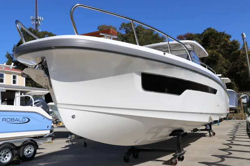 Slide: The Image of 2025 Nimbus T11 boat on display, showcasing sleek design and modern features. - 5