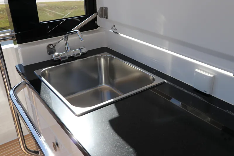 Slide: The Image of Luxurious seating in 2025 Nimbus T11 boat cockpit, featuring sleek design and premium materials. - 23