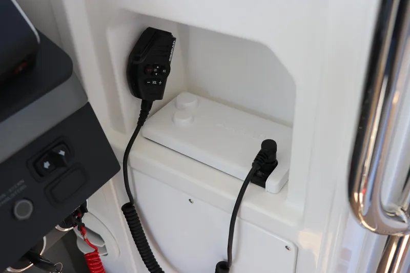 Slide: The Image of Control panel of 2025 Nimbus T11 boat featuring joystick and throttle controls. - 33