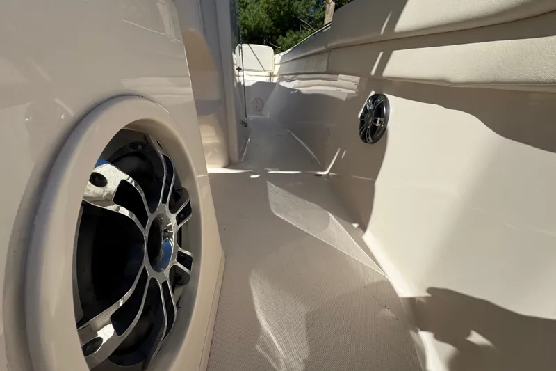 Slide: The Image of 2022 Grady-White Canyon 326 boat interior with speaker detail, showcasing sleek design. - 46