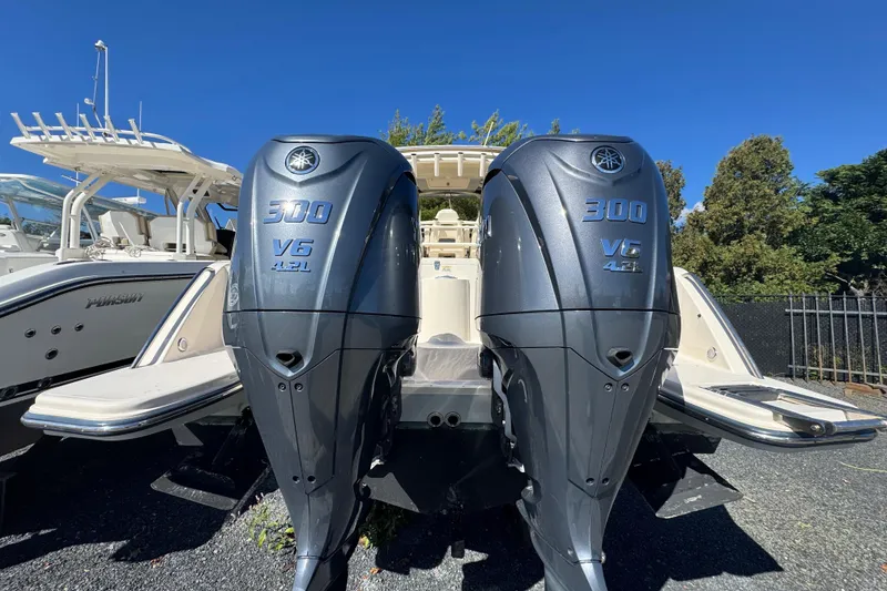 Slide: The Image of 2022 Grady-White Canyon 326 with twin Yamaha 300 V6 outboard engines. - 5