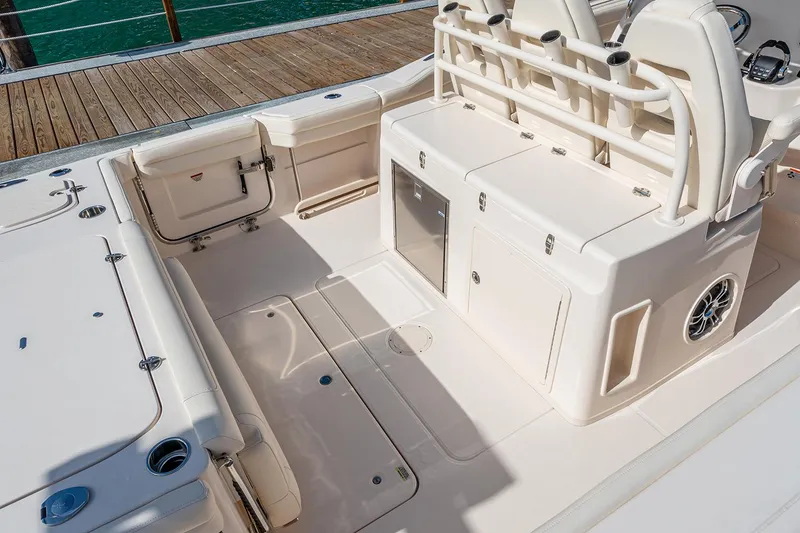 Slide: The Image of Manufacturer Provided Image: 2022 Grady-White Canyon 326 boat interior, featuring spacious deck and seating area. - 8