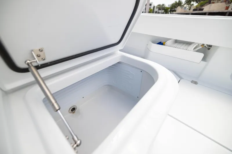 Slide: The Image of Open storage compartment on 2026 Freeman 47 LX boat, showcasing interior space and design. - 20