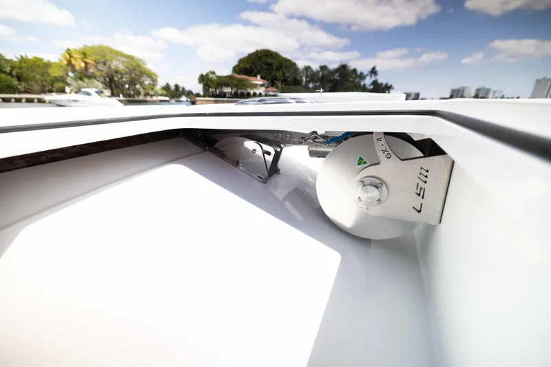 Slide: The Image of Freeman 47 LX 2026 boat anchor compartment with clear sky background. - 9