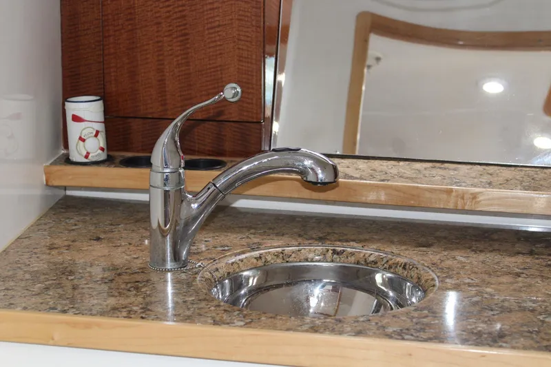 Slide: The Image of Luxury boat kitchen sink with chrome faucet on Contender 38 Express, 2008 model. - 48