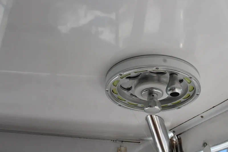 Slide: The Image of Ceiling-mounted light fixture on a 2008 Contender 38 Express boat. - 66