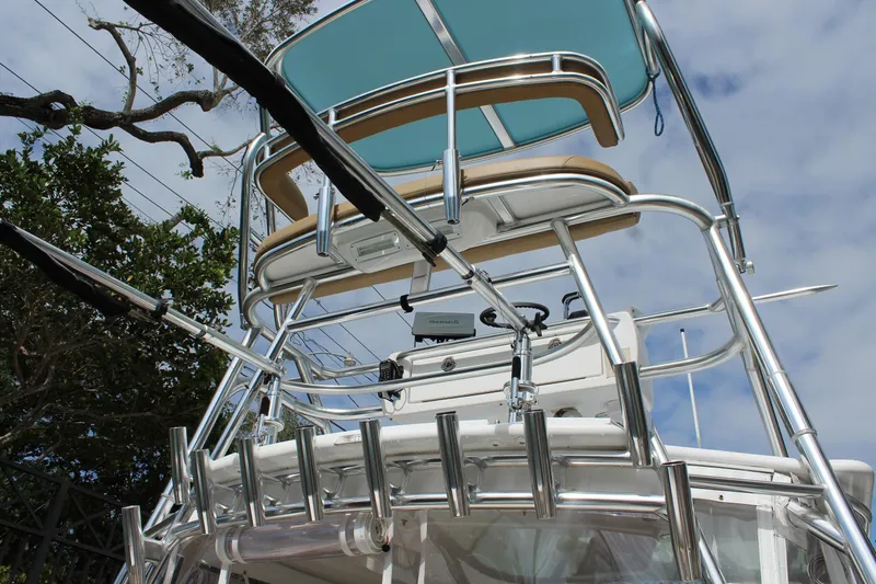 Slide: The Image of 2008 Contender 38 Express boat with tower and rod holders, viewed from below. - 7