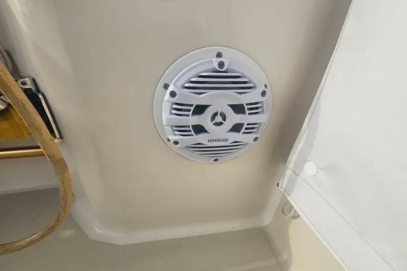 Slide: The Image of Kenwood speaker installed on 2006 Carolina Classic 25 Express boat interior. - 14