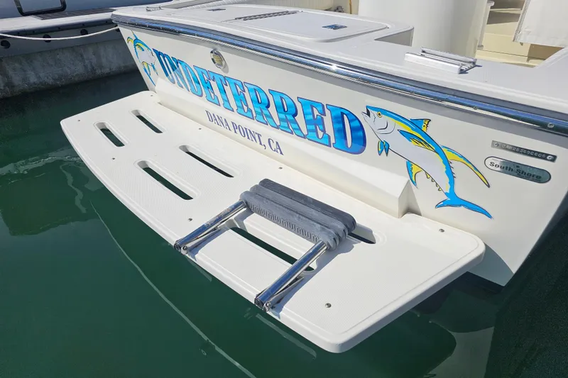 Slide: The Image of 2006 Carolina Classic 25 Express boat with "Undeterred" name and fish graphic, Dana Point, CA. - 4