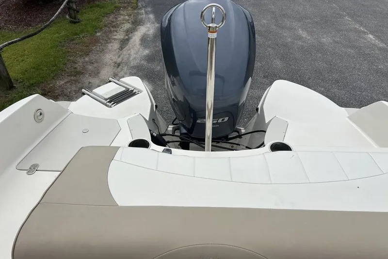 Slide: The Image of 2015 Stingray 234LR boat with Yamaha outboard motor, rear view. - 25