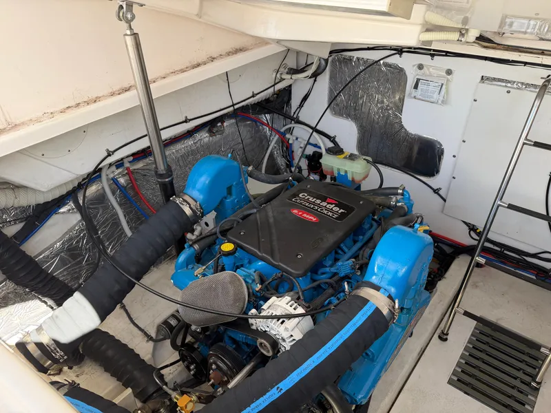 Slide: The Image of 2006 Tiara Yachts 3600 Sovran interior with wooden cabinetry and mounted TV. - 34