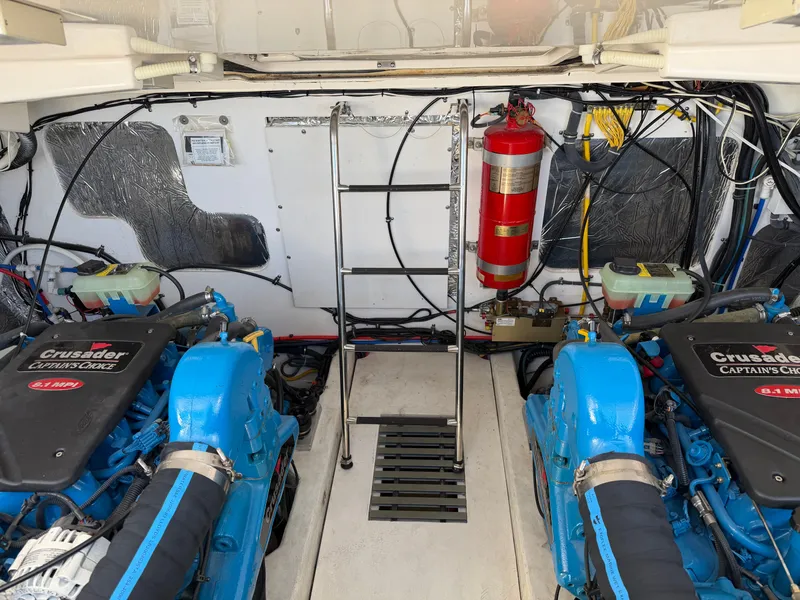 Slide: The Image of Interior of 2006 Tiara Yachts 3600 Sovran with wooden cabinetry and cozy seating area. - 35