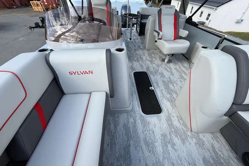 Slide: The Image of 2026 Sylvan X-3 LZ DH boat interior with modern seating and stylish design. - 15