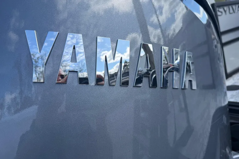 Slide: The Image of Chrome "Yamaha" logo on a sleek Sylvan X-3 LZ DH 2026 model. - 19